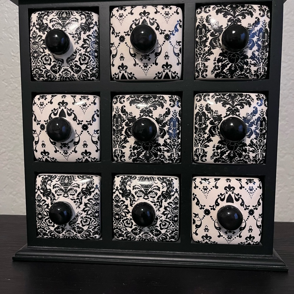 Spice or jewelry apothecary cabinet.